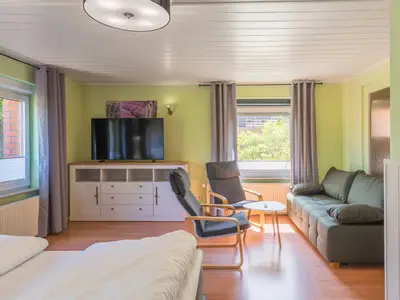 Ferienwohnung Marienkäfer Waren einladender Wohnbereich