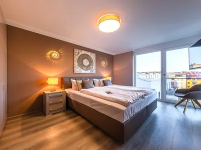 Ferienwohnung Auszeit: Schlafzimmer mit Doppelbett