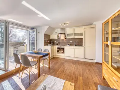 Ferienwohnung Kietz-Koje - Waren (Müritz)- Wohnzimmer mit Seeblick