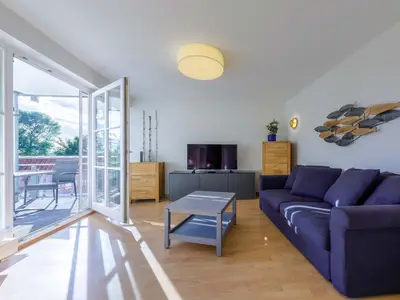 Ferienwohnung Jolle Waren Müritz - Wohnraum mit gemütlicher Sitzecke