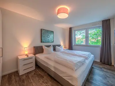 Ferienwohnung Hafenflair Hafenresidenz: Schlafzimmer mit Doppelbett