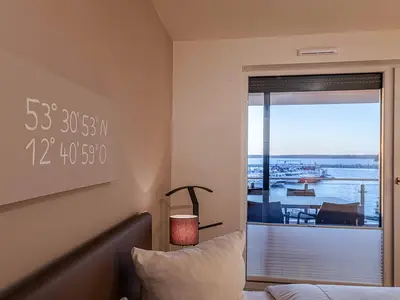 Ferienwohnung Quartier Lounge Hafenresidenz: Schlafzimmer mit Ausblick