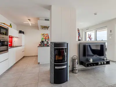 Ferienwohnung Müritzoase Hafenresidenz: Wohnzimmer mit Kamin