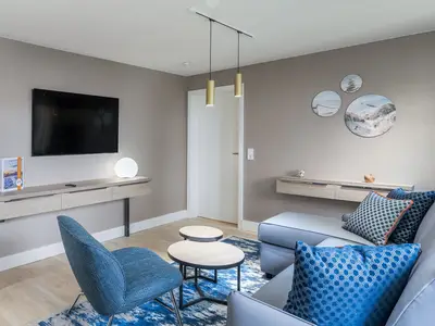 Ferienwohnung Hafendomicil Citymarina Wohnzimmer mit TV