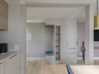 Ferienwohnung Hafendomicil Citymarina Wohnzimmerschrankwand