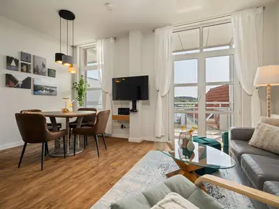 Ferienwohnung Hafenkino Müritz Wohnzimmer mit TV