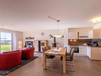 Ferienwohnung Libelle Hafenresidenz: Wohnzimmer mit Essbereich