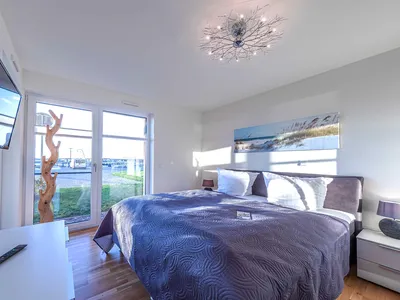 Ferienwohnung Fischotter:  Schlafzimmer mit Doppelbett