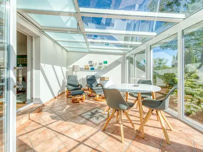 Ferienwohnung Eddi Blick in den Wintergarten
