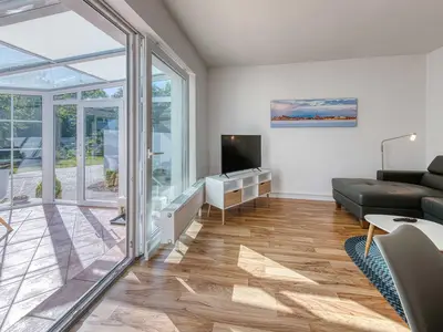Ferienwohnung Eddi Wohnbereich und Wintergarten