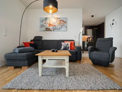 Ferienwohnung Fischotter Hafenresidenz Gemütlicher Wohnbereich