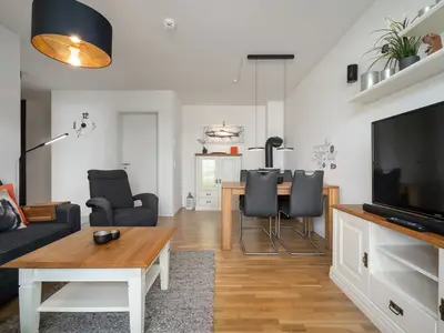 Ferienwohnung Fischotter Hafenresidenz Blick der Terrasse in den Wohnbereich