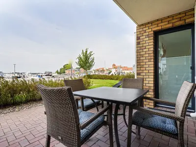 Ferienwohnung Fischotter Hafenresidenz Terrasse direkt am Hafen