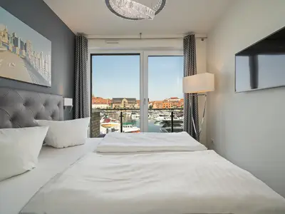 Ferienwohnung First Marina View Hafenresidenz Schlafzimmer