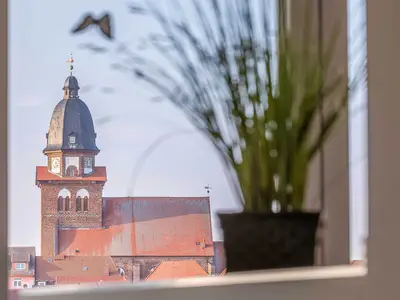 ChatGPT:  Ferienwohnung Sieglinde Hafenresidenz Waren (Müritz) – Charmanter Ausblick auf die Altstadt und den Kirchturm