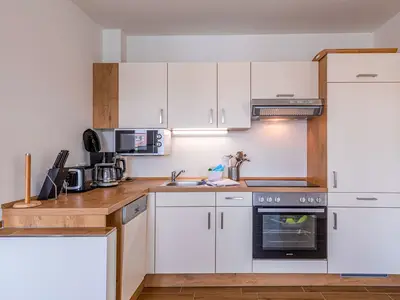 ChatGPT:  Ferienwohnung Sieglinde Hafenresidenz Waren (Müritz) – Moderne voll ausgestattete Küche mit hochwertigen Gerät