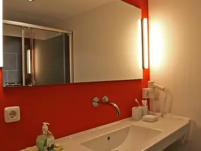Appartement "Auenfeld" das  Bad mit Dusche und WC