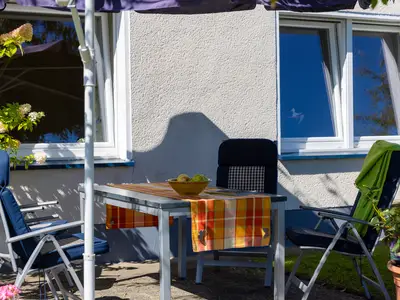 Sitzplatz mit Sonnenschirm