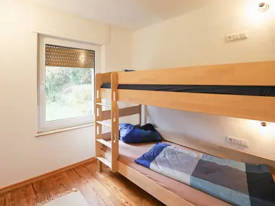 Wegwarte Ferienwohnung Schlafzimmer mit Etagenbett