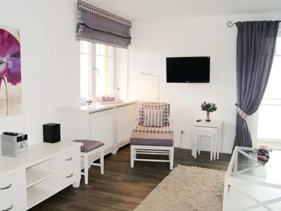 Wohnzimmer in der Ferienwohnung Strandloge im Haus Strand Residenz in Wittdün auf Amrum