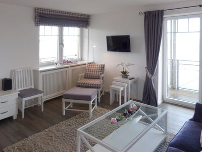 Wohnzimmer in der Ferienwohnung Strandloge im Haus Strand Residenz in Wittdün auf Amrum