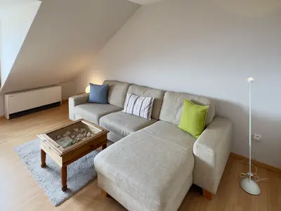 Wohnzimmer in der Ferienwohnung Gaubenkieker des Hauses Südspitze 17 in Wittdün auf Amrum