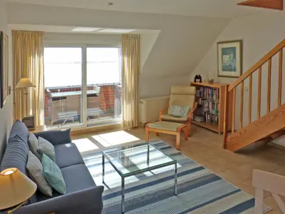 Wohnzimmer in der Ferienwohnung Obere Wandelbahn 15/9 in Wittdün auf Amrum
