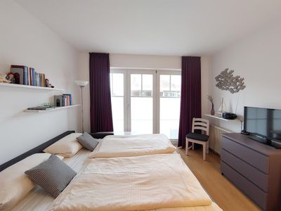 Wohnzimmer mit Schlafcouch in der Ferienwohnung Auszeit am Meer in Wittdün auf Amrum