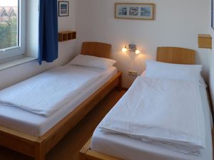 Schlafzimmer in der Ferienwohnung Therese 8 in Wittdün auf Amrum