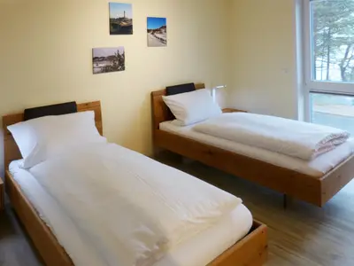 Schlafzimmer 2 der Ferienwohnung Weiße Düne 5 in Wittdün auf Amrum