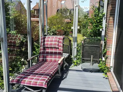 Überdachter Balkon der Ferienwohnung Passat im Haus Kap Hoorn in Wittdün auf Amrum