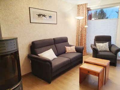 Wohnzimmer mit Sitzecke in der Ferienwohnung Passat im Haus Kap Hoorn in Wittdün auf Amrum