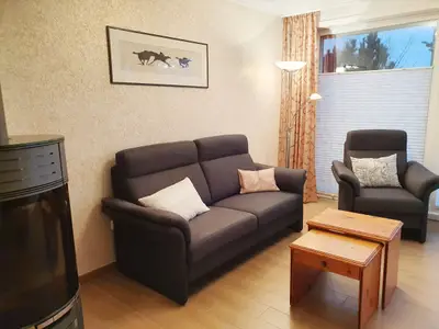 Wohnzimmer mit Sitzecke in der Ferienwohnung Passat im Haus Kap Hoorn in Wittdün auf Amrum