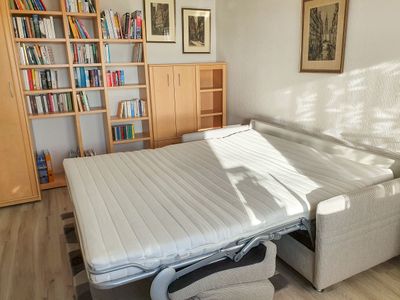 Schlafzimmer mit Schlafcouch in der Wohnung Gorch Fock im Haus Kap Hoorn in Wittdün auf Amrum