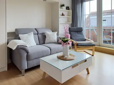 Wohnzimmer der Ferienwohnung Südspitze 18/6 Meerblick in Wittdün auf Amrum