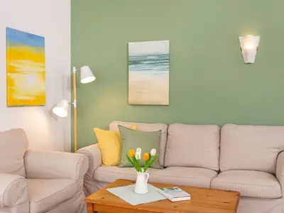 Gemütliche Sofaecke in der Wohnung Jungnamen Sand 01