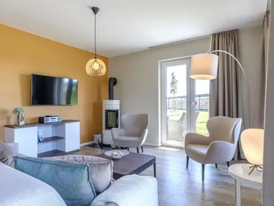Ferienwohnung Strandidylle Ostseebad Wustrow mit gemütlicher Fernsehecke