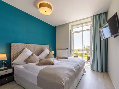 Ferienwohnung Sonnenblume Ostseebad Wustrow Schlafzimmer mit Boxspringbett