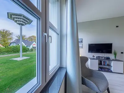 Ferienwohnung Lütt Matten Wustrow ZweiWasser Alte Seefahrtschule Gartenblick