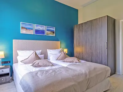 Ferienwohnung Lütt Matten Wustrow ZweiWasser Alte Seefahrtschule Schlafzimmer
