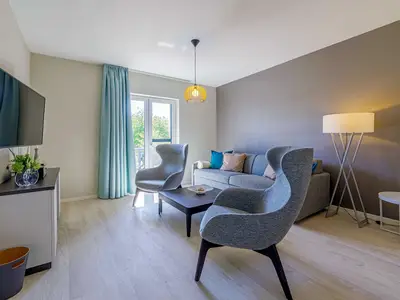 Ferienwohnung Kroonkieker Ostseebad Wustrow ZweiWasser Alte Seefahrtschule Wohnzimmer