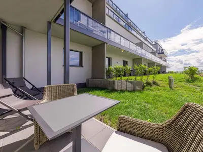 Ferienwohnung Gänseblümchen Wustrow Terrasse