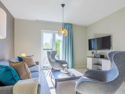 Ferienwohnung Achterndieck Ostseebad Wustrow ZweiWasser Alte Seefahrtschule Wohnzimmer