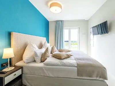 Ferienwohnung Dünenkieker Ostseebad Wustrow ZweiWasser Alte Seefahrtschule Schlafzimmer