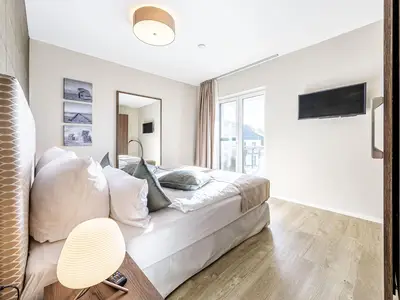 Ferienwohnung Boddenstuv Ostseebad Wustrow ZweiWasser Alte Seefahrtschule Schlafzimmer