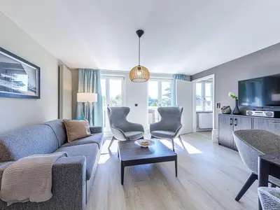 Ferienwohnung Strandräuber Ostseebad Wustrow ZweiWasser Alte Seefahrtschule Wohnzimmer