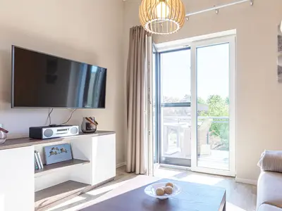 Ferienwohnung Magelan Suite Ostseebad Wustrow ZweiWasser Alte Seefahrtschule Wohnzimmer