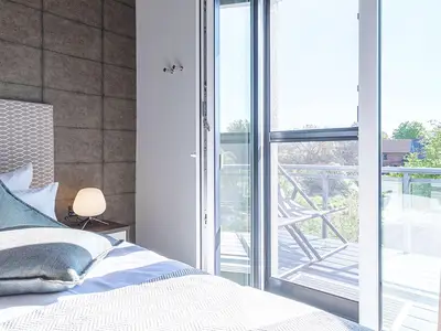 Ferienwohnung Magelan Suite Ostseebad Wustrow ZweiWasser Alte Seefahrtschule Schlafzimmer