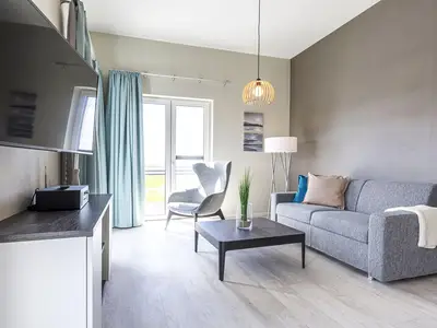 Ferienwohnung Vitus Bering Suite Ostseebad Wustrow ZweiWasser Alte Seefahrtschule Wohnzimmer