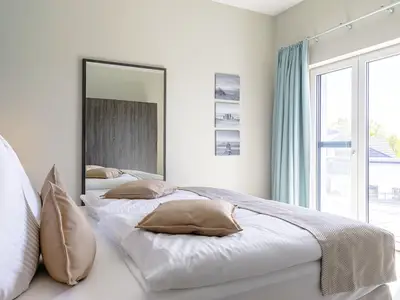 Ferienwohnung Vitus Bering Suite Ostseebad Wustrow ZweiWasser Alte Seefahrtschule Schlafzimmer